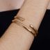 Pulseira Aberta em Metal Dourado