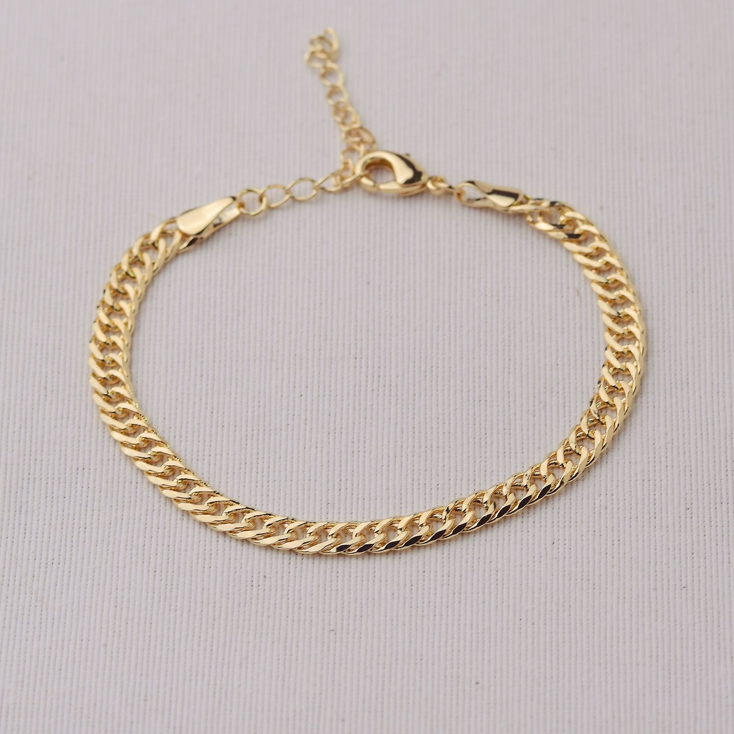 Pulseira Dourado Elos Entrelaçados em Metal 19+5cm