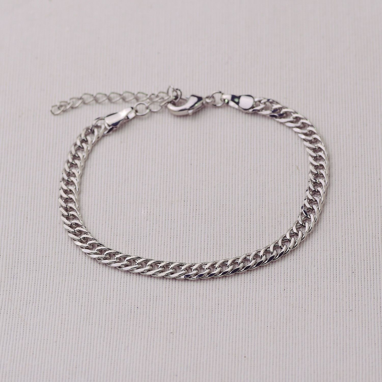 Pulseira Ródio Elos Entrelaçados em Metal 19+5cm